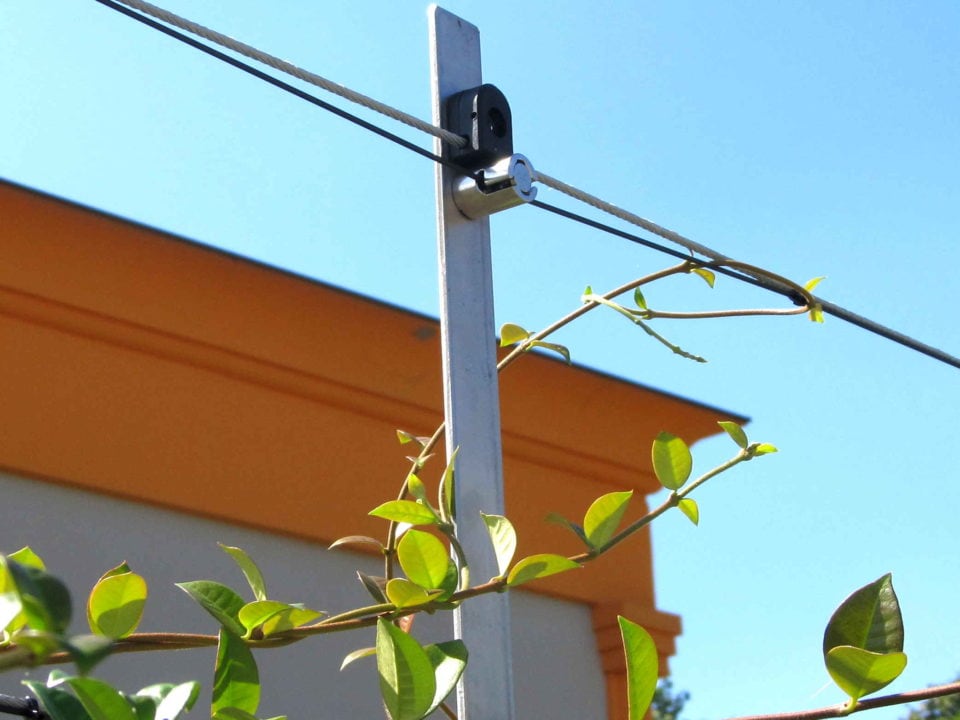 Fence intrusion protection with LiteWIRE attached to metal rope