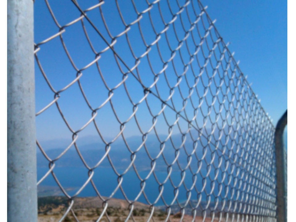 LiteFENCE intrusion detection system with plastic optical fiber LiteWIRE applied to a flexible, chain link fence